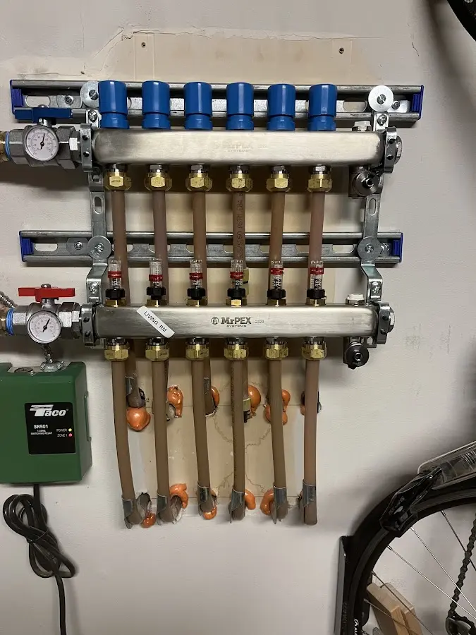 Plumber performing Water Heater Repair at a residential property in Bellmawr